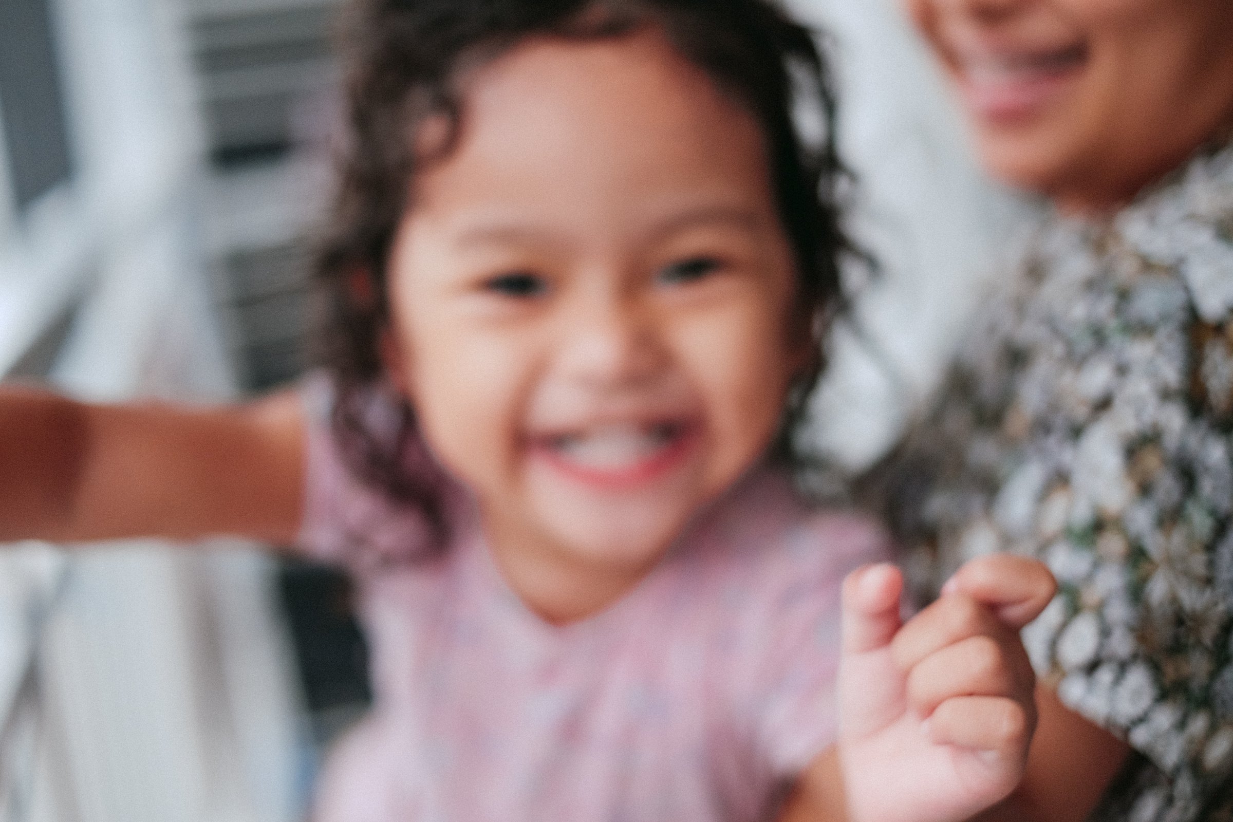 cute kid with mom blur